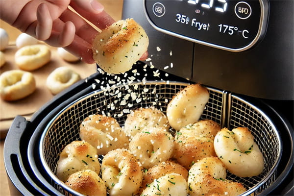 Cook the garlic knots  in the air fryer basket